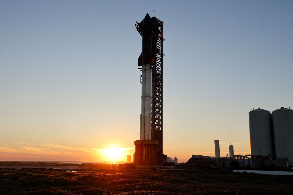 The space shuttle is visible at the location belonging to SpaceX standing at the space base.