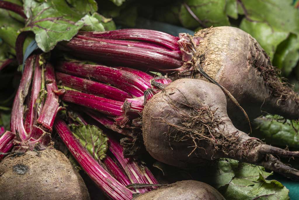 The image shows beets as a high fiber food.