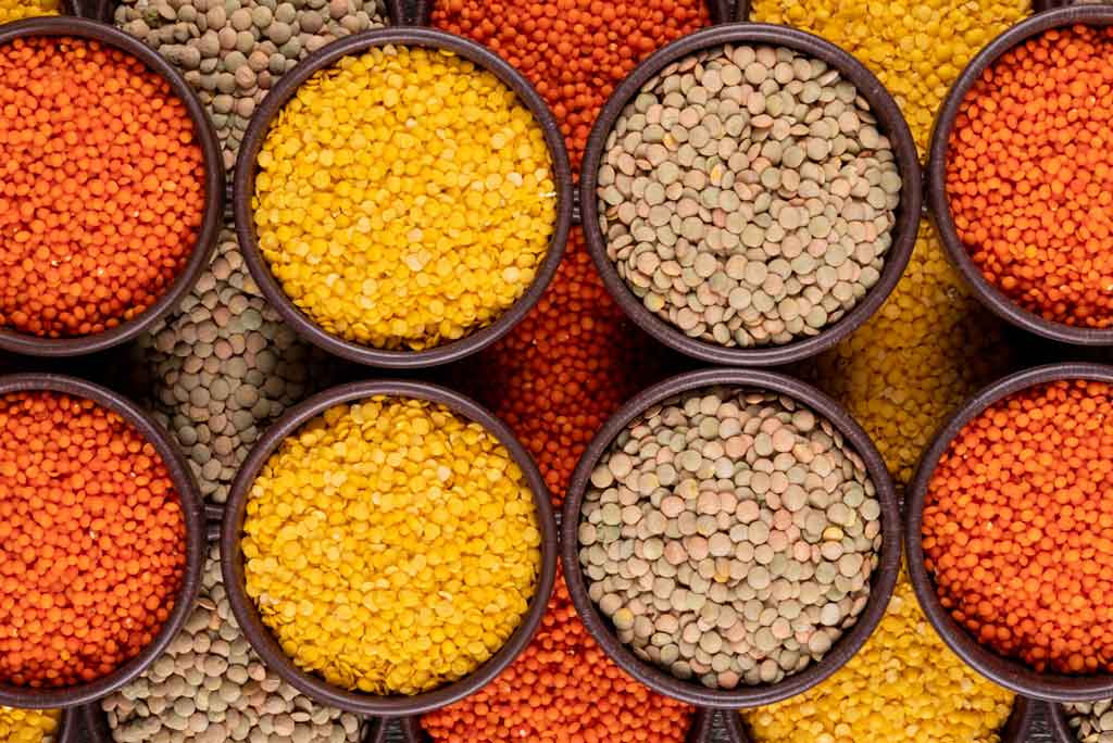 The image shows lentils as a high fiber food.