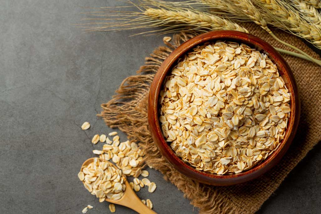 The image shows oats as a high fiber food.