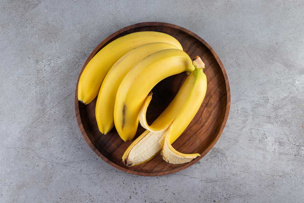 The image shows bananas as a high fiber food.